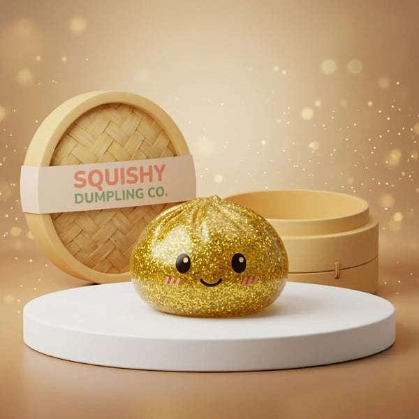 Studio photo of the gold glitter dumpling squishy with bamboo steamer