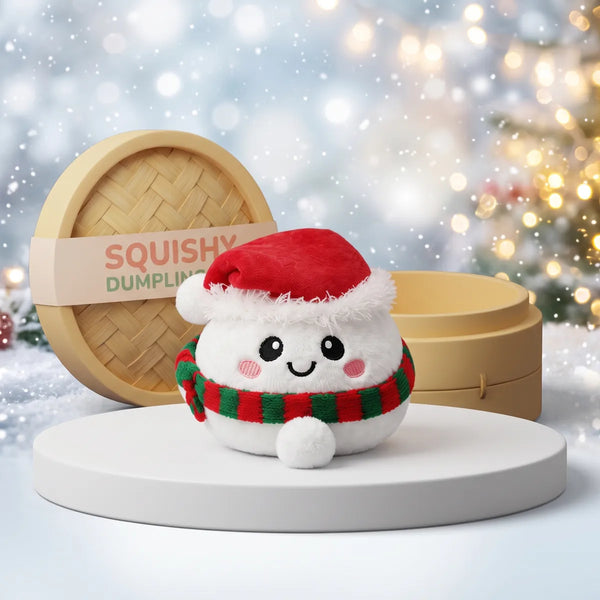 Chilly Snowman Dumpling Squishy Plush on a white studio podium beside a steamer basket