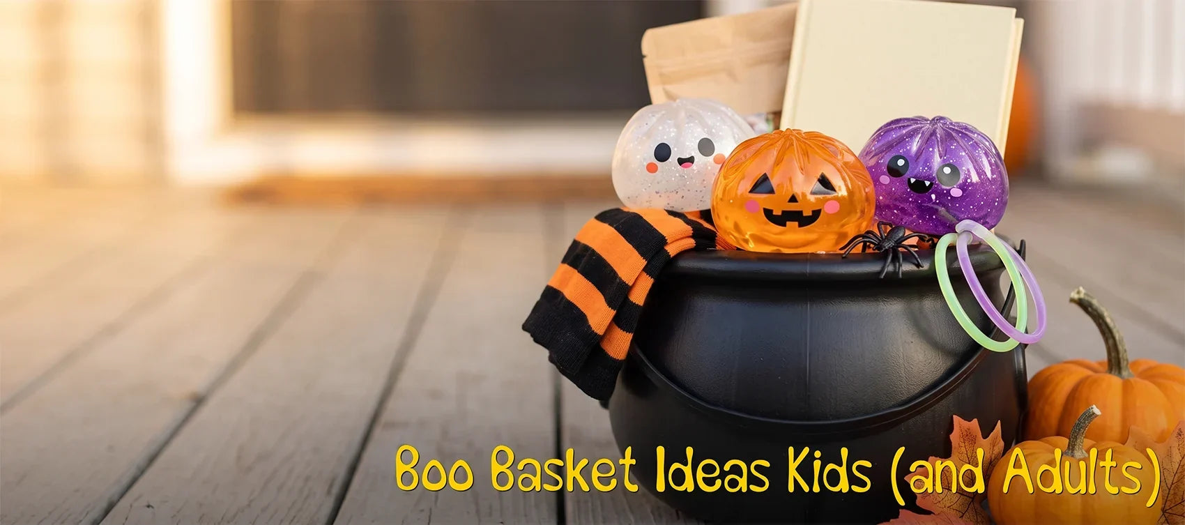 Halloween boo basket in a black cauldron filled with pumpkin, ghost and purple dumpling squishies