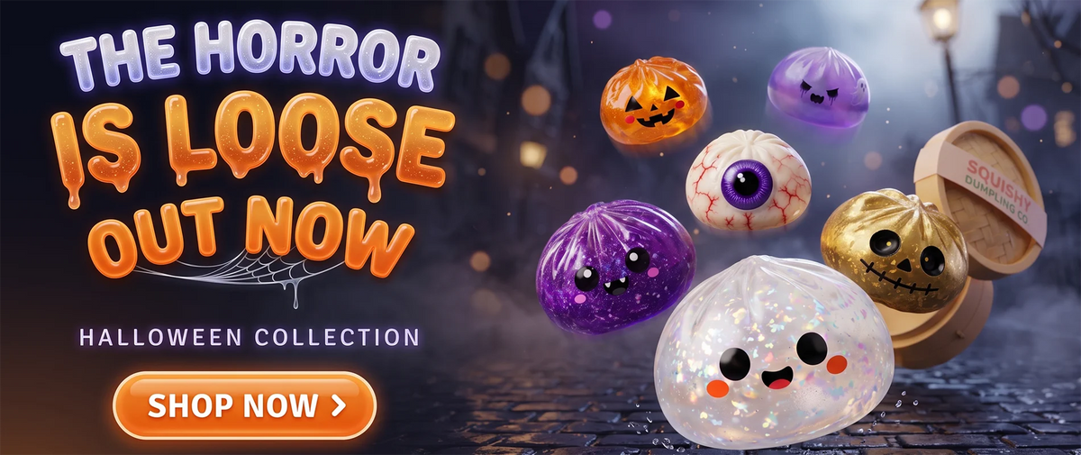 Halloween dumpling squishies in a bamboo steamer with ghost, pumpkin and zombie designs
