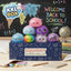 XXL back to school dumpling squishy set of 7 stacked on its printed box in a classroom
