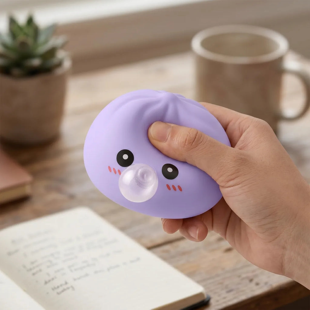 Blue blow dumpling squishy styled as cute desk decor