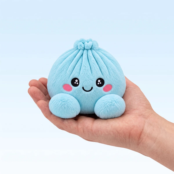Sky Blue Dumpling Squishy Plush resting on an open palm to show its real size