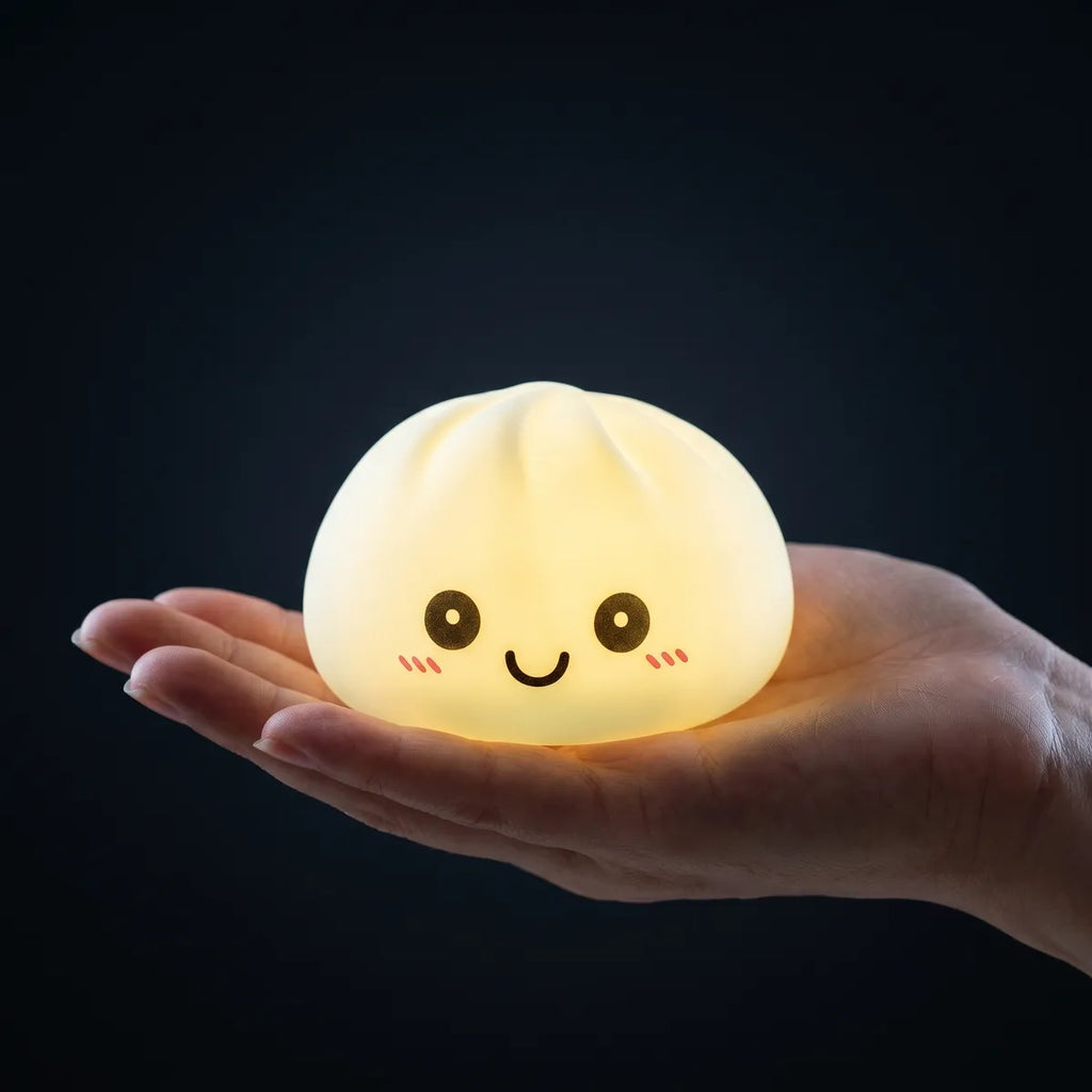 Blue squishy dumpling light held in hand