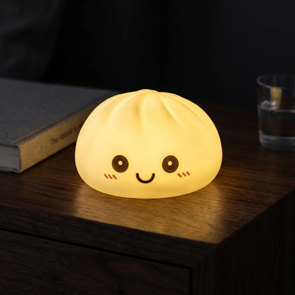 Blue squishy dumpling light displayed with bamboo steamer