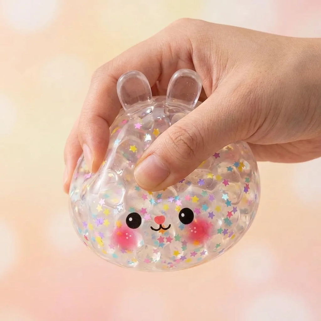 Hand squeezing the Hoppy Bunny Bubble Dumpling Squishy