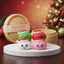 Merry Christmas Hat Dumpling Squishy Set 4 Pieces: green and red squishies behind, white and pink in front, on a white podium with a Squishy Dumpling Co. steamer lid and basket