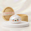 Cloud white unique dumpling squishy on a display podium