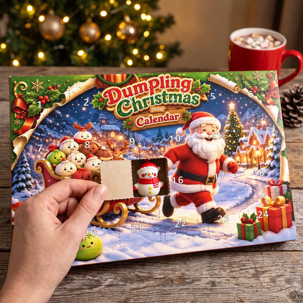 Hand opening a numbered door of the Santa Sleigh Dumpling Squishy Advent Calendar 24 Pieces