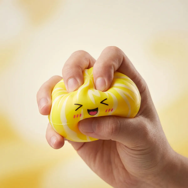 Dumpling squishy bun mystery toy being squeezed showing slow rising foam