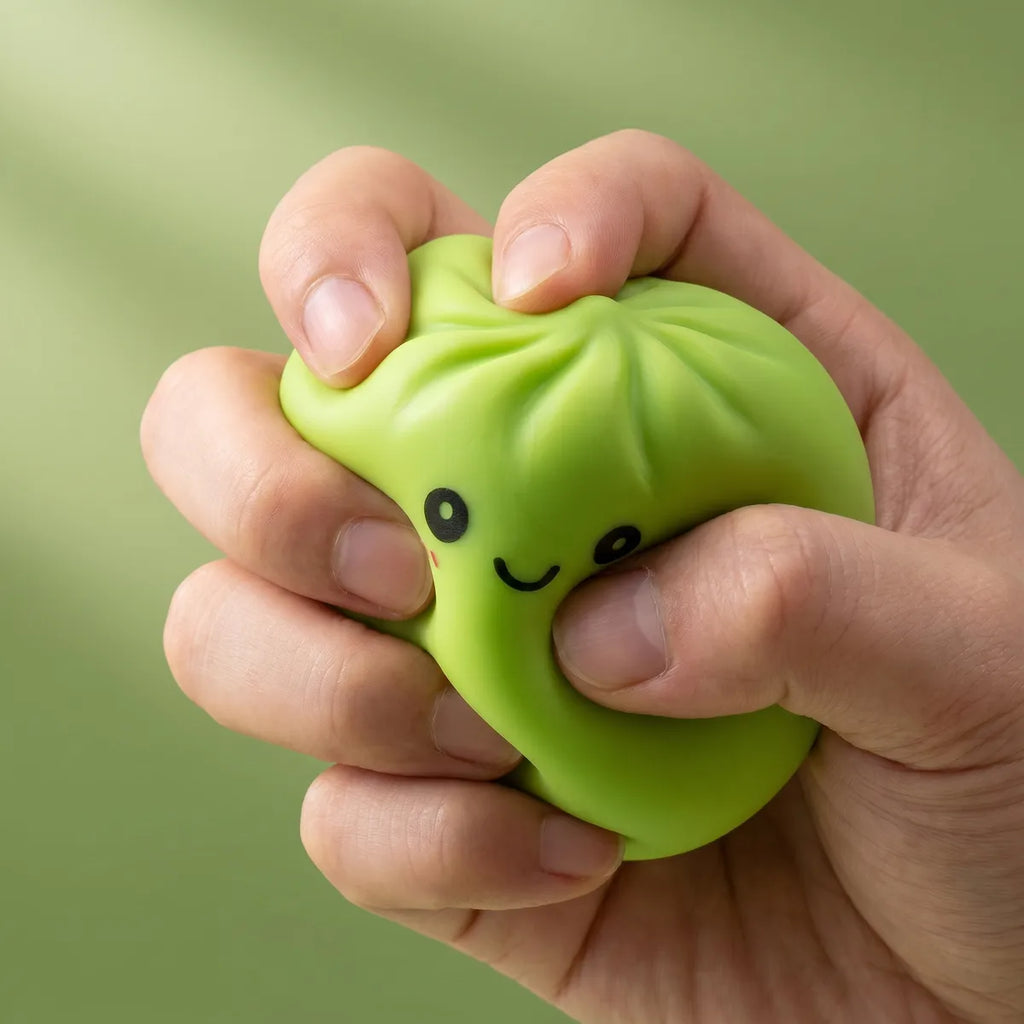 Dumpling squishy mystery box squishy being squeezed slow rising