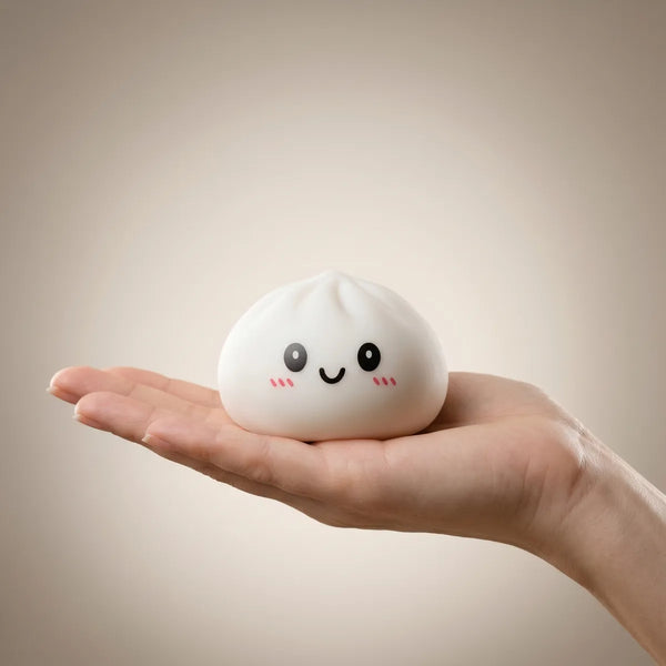 Dumpling squishy set 6 pieces held in hand lifestyle shot