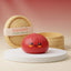Fluffy red dumpling squishy bun with bamboo steamer