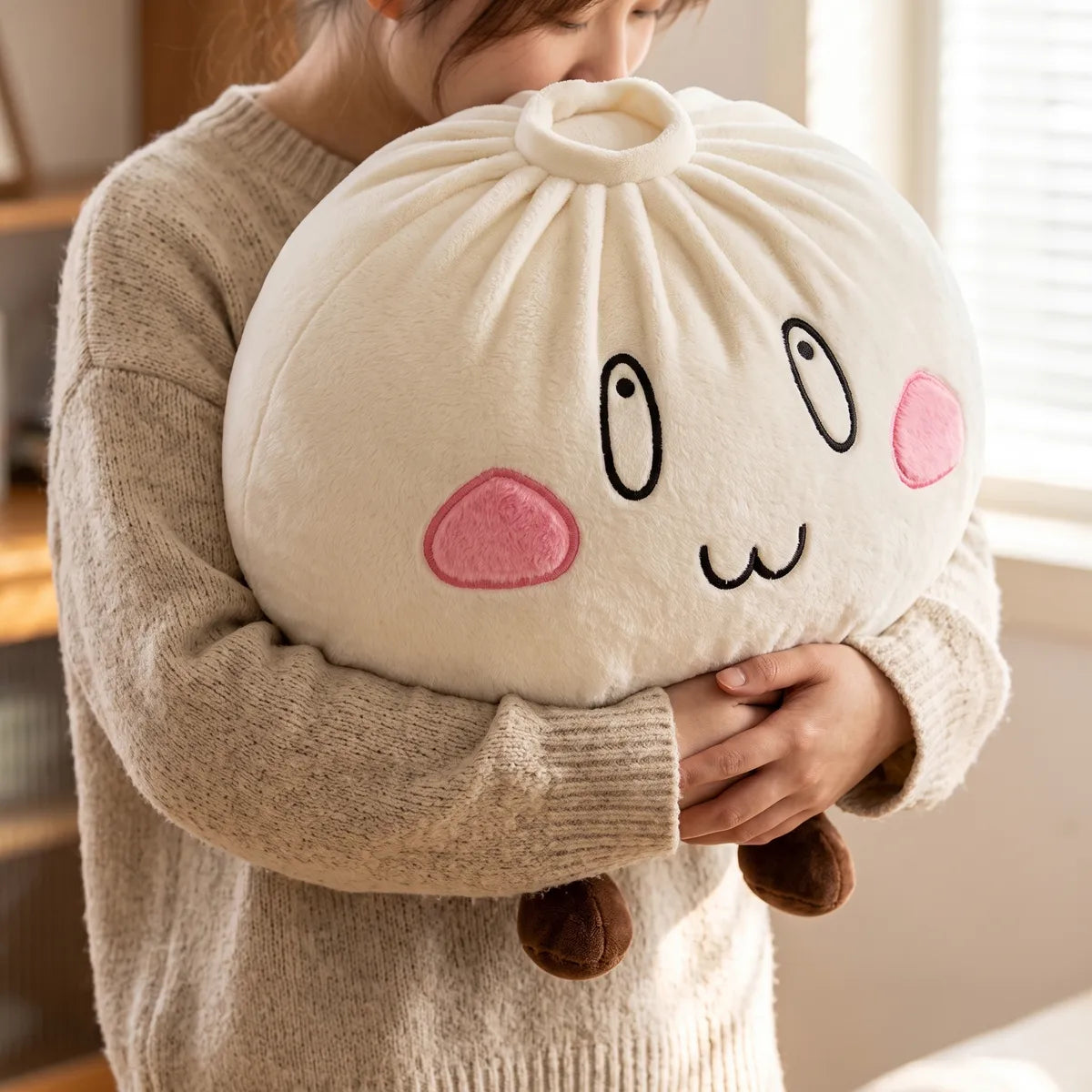 Person hugging the Giant Funny Happy Dumpling Squishy Plush against a soft sweater