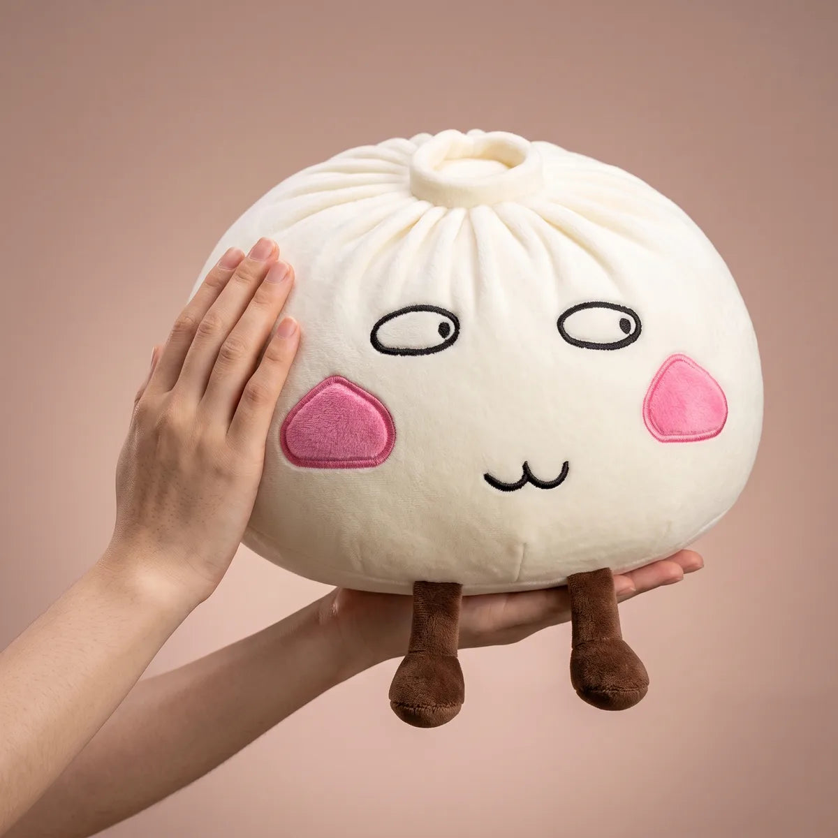 Giant Funny Proud Dumpling Squishy Plush held in two hands to show its giant size