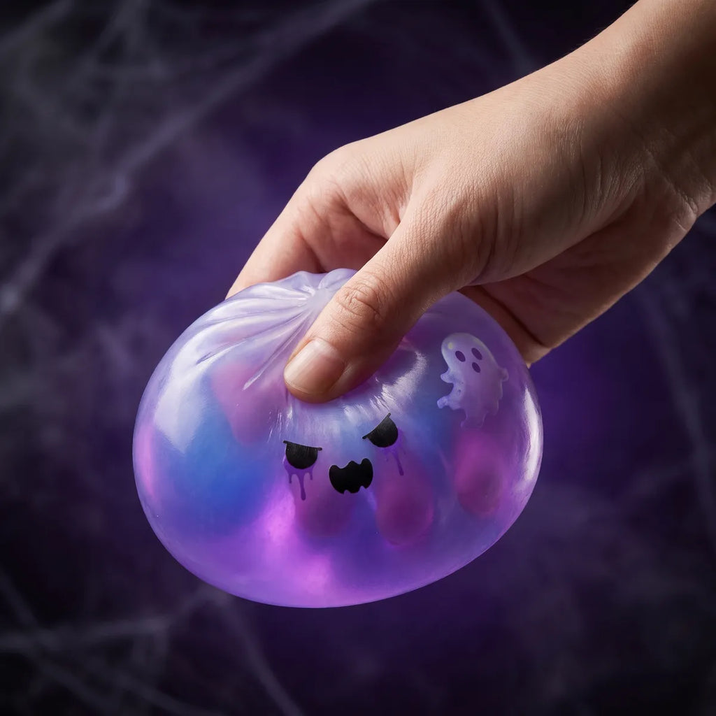 Ghost dumpling squishy being squished to show slow-rise foam