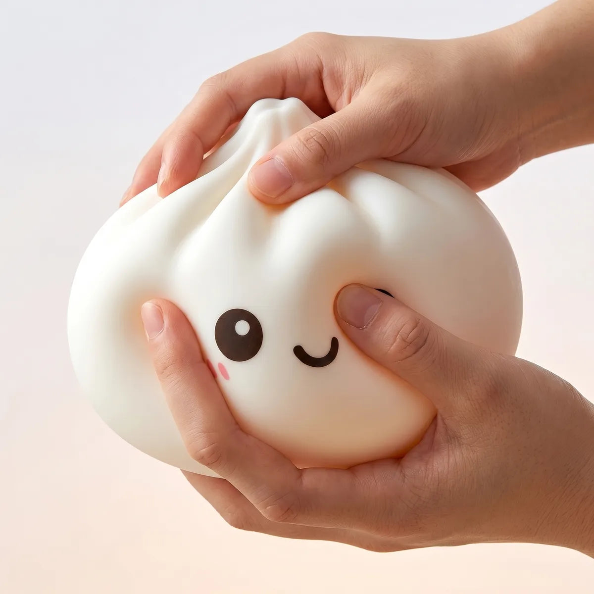 Giant dumpling squishy toy being squeezed showing slow rising foam