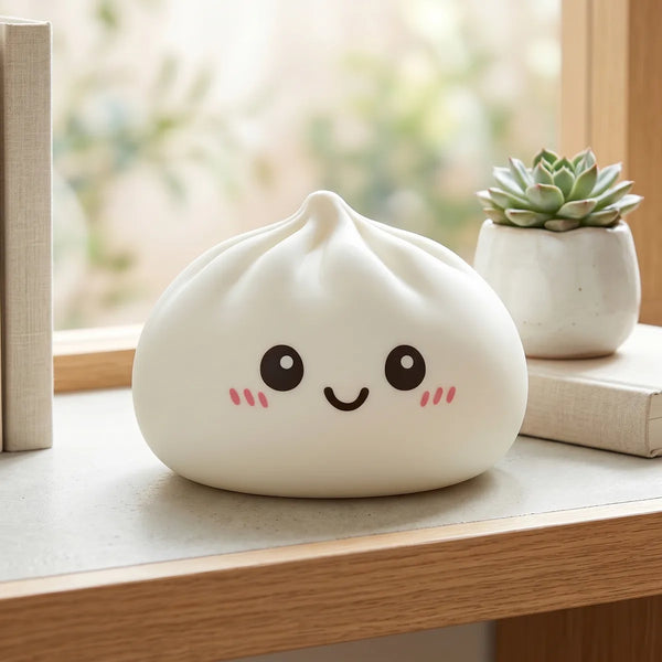 Giant dumpling squishy toy displayed with bamboo steamer