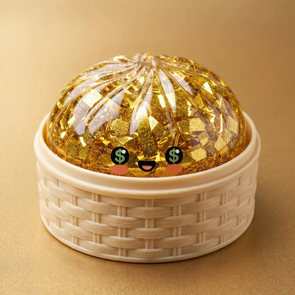 Close-up of the glitter-filled Gold Dumpling Squishy sitting in a woven bamboo steamer basket