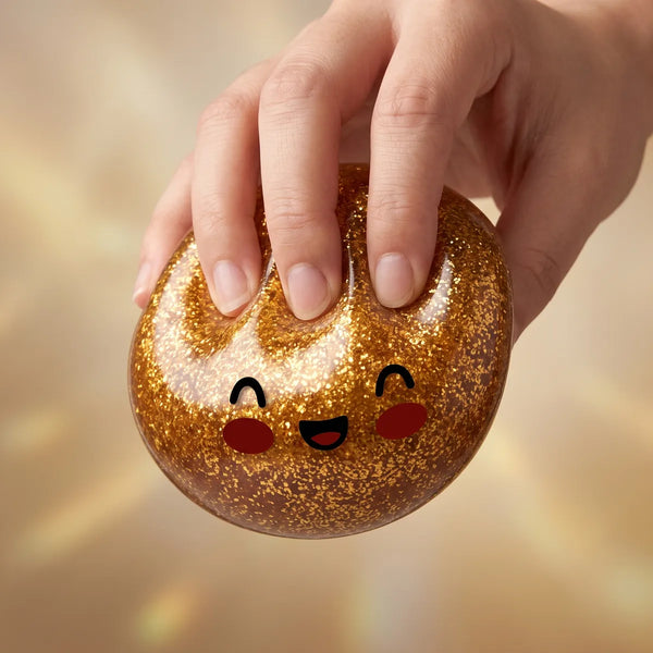 Gold unique glitter dumpling squishy slowly rising back to shape