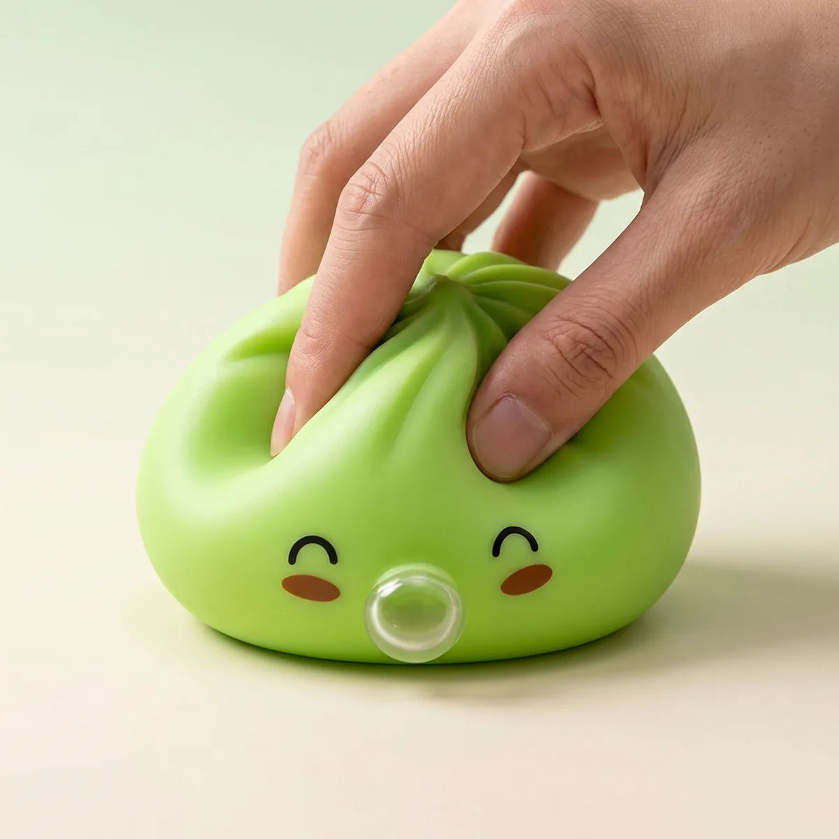 Green rare blow dumpling squishy slowly rising back to shape