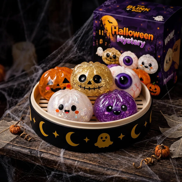 Halloween dumpling squishy set shown with its bamboo steamer style Halloween gift boxes