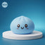 Jumbo large blue dumpling squishy on a display podium