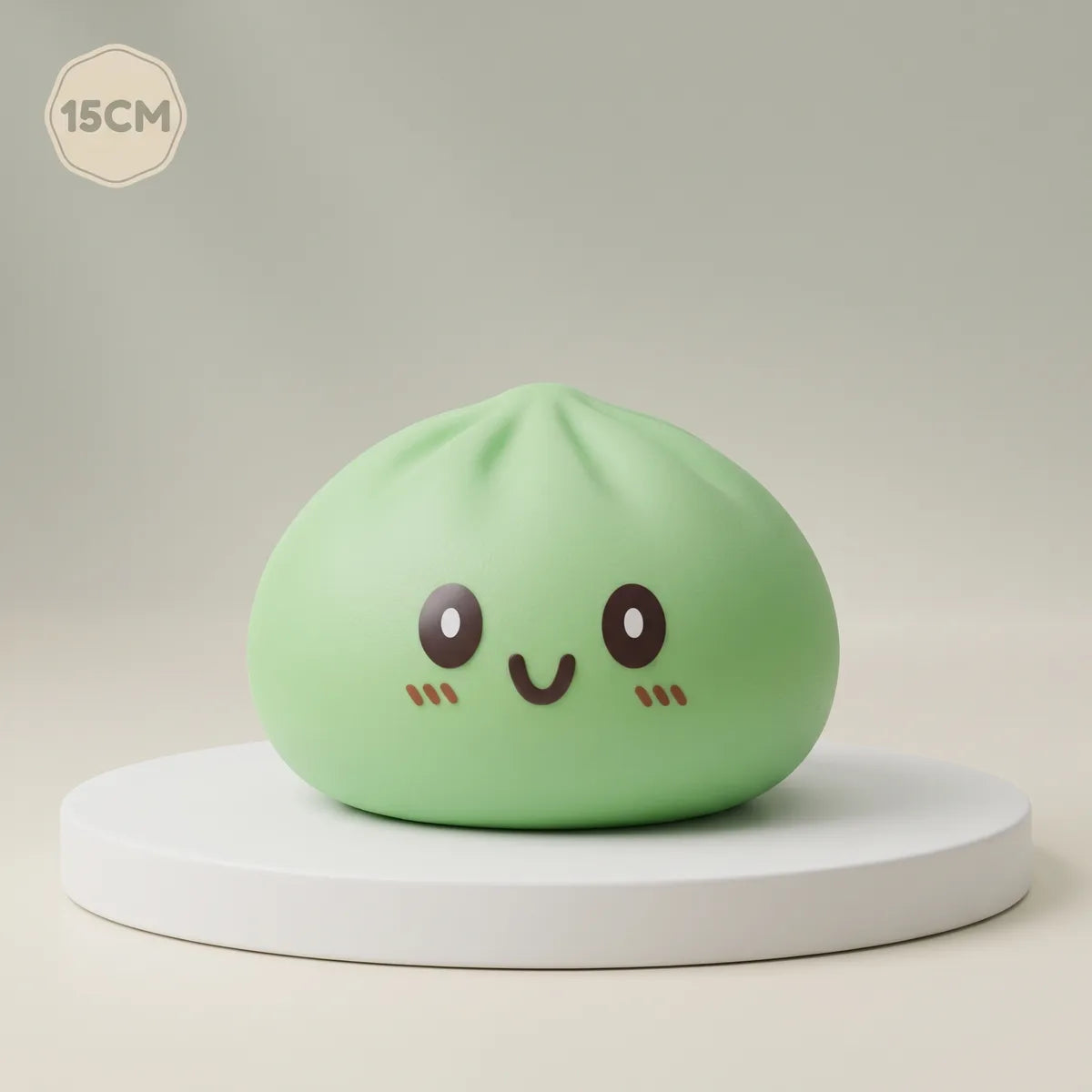 Jumbo large green dumpling squishy on a display podium Main image