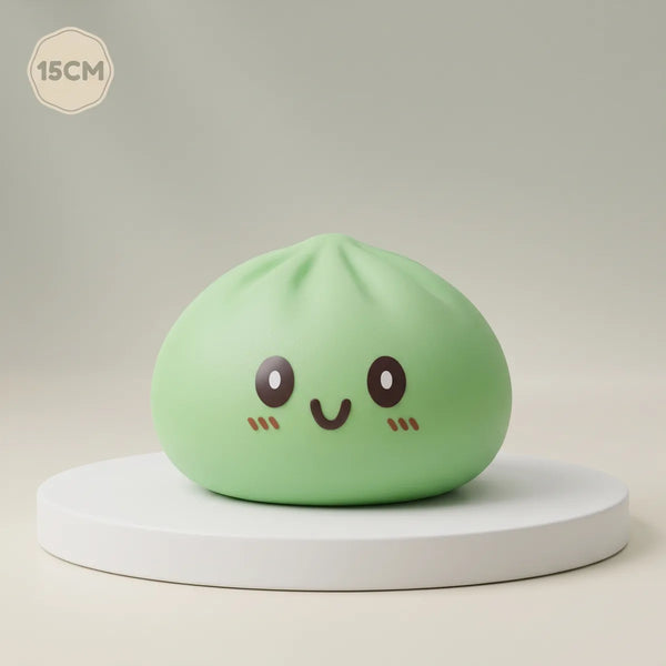 Jumbo large green dumpling squishy on a display podium