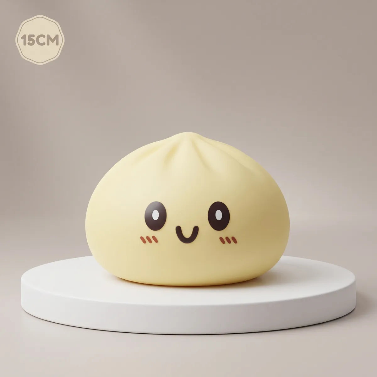 Jumbo large yellow dumpling squishy on a display podium Main image