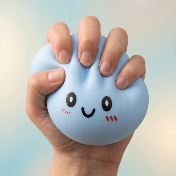Large blue dumpling squishy slowly rising back to shape