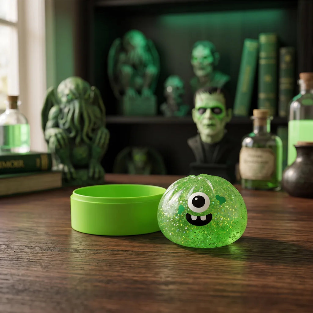 Monster Halloween dumpling squishy in a green misty haunted lifestyle scene with cobwebs