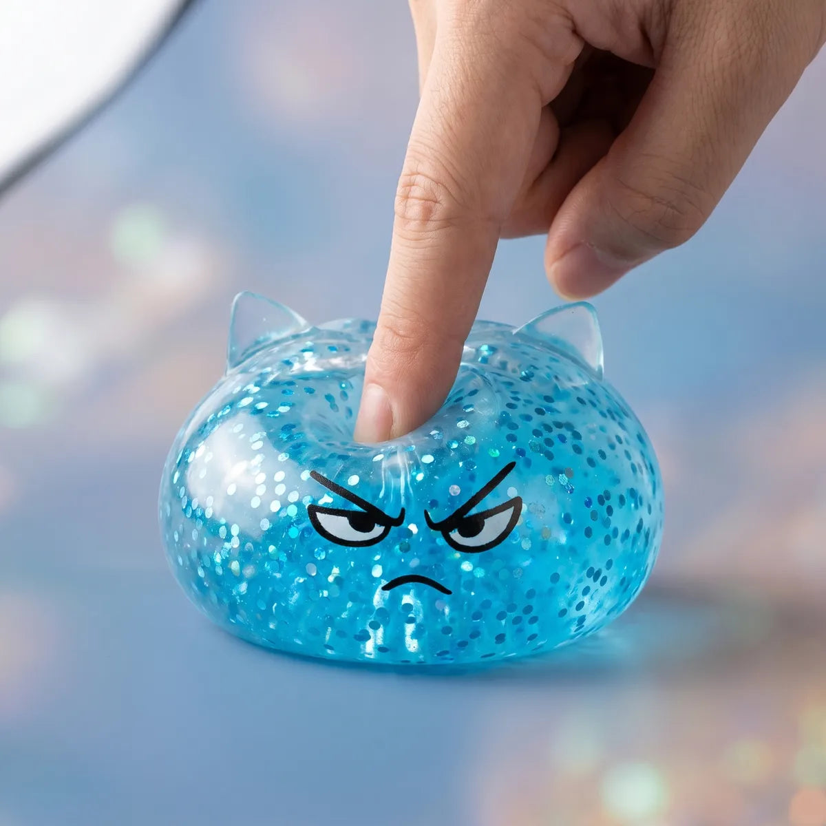 Unicorn glitter mystery dumpling squishy being squeezed slow rising