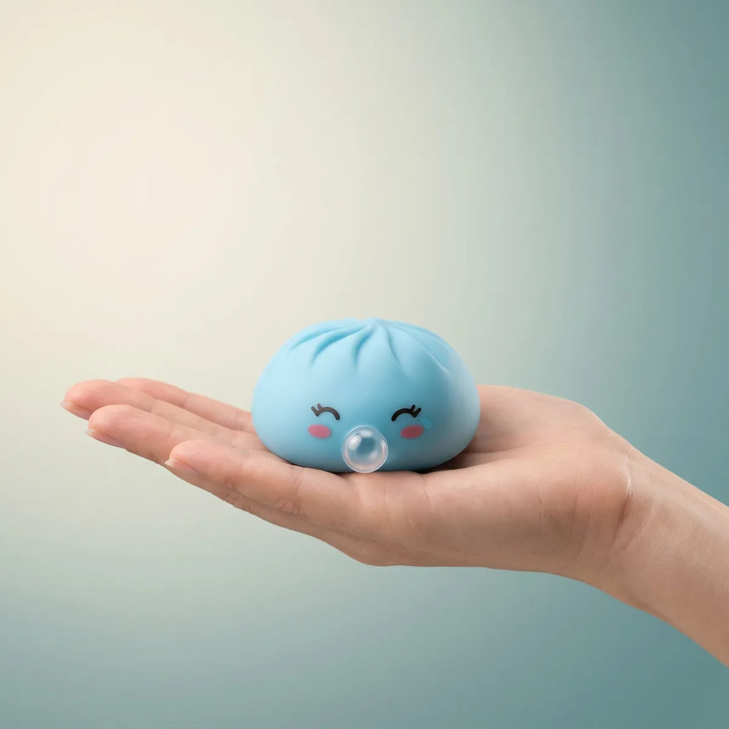 Mystery dumpling squishy toys held in hand lifestyle shot