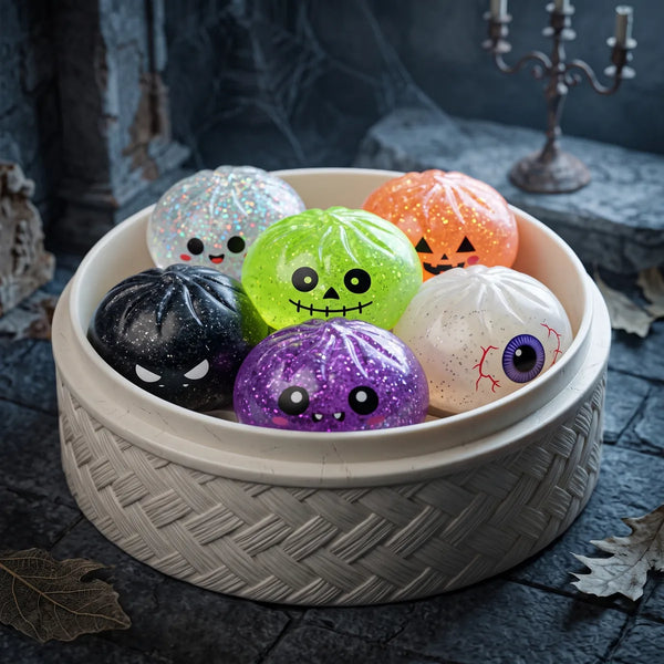 Sealed Halloween mystery dumpling squishy boxes shown with a bamboo steamer style gift box