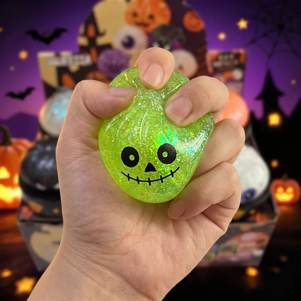 Halloween mystery dumpling squishy squeezed flat to show its slow rising rebound