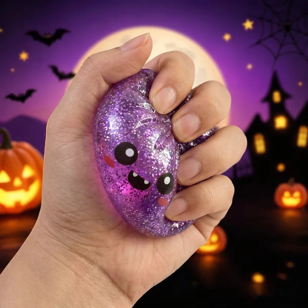 Close up squeeze showing the glitter gel fill and soft skin of a Halloween mystery dumpling squishy