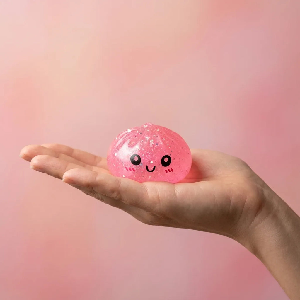 Mini glitter dumpling squishy set in a cozy lifestyle setting