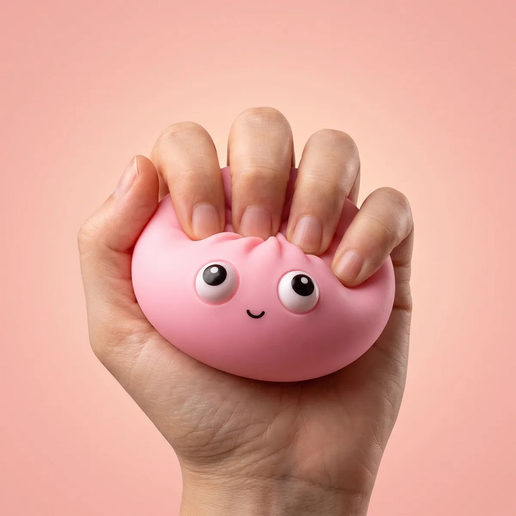Close up squeeze of a mystery pop dumpling squishy showing its matte pastel skin