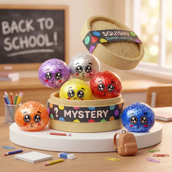 Mystery puppy eyed dumpling squishies spilling from a Mystery steamer box on a school desk
