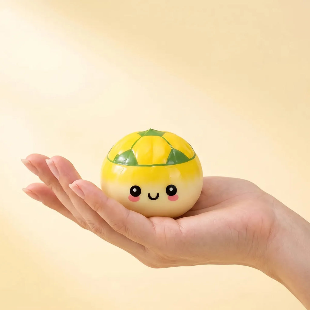 Mystery soccer dumpling squishy held in hand