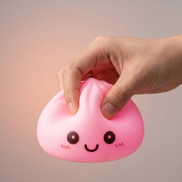 Mystery squishy dumpling night light being squeezed showing slow rising foam