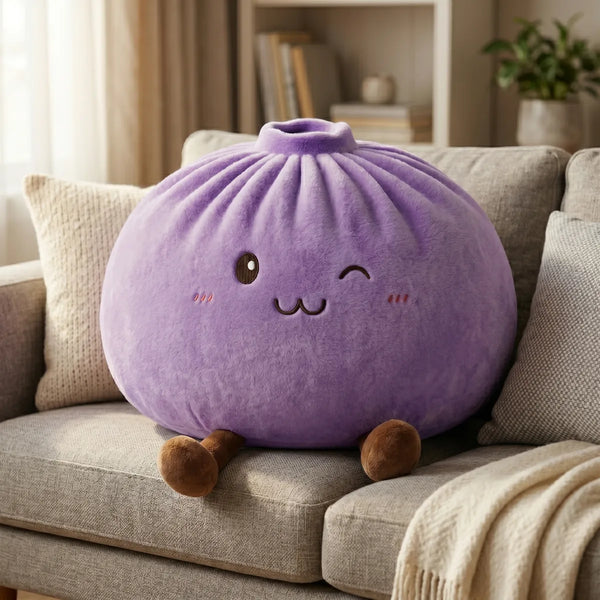 Purple large dumpling squishy plush pillow styled on a sofa