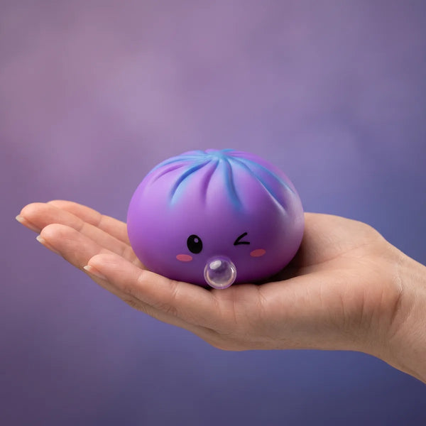 Hand holding a soft purple rare blow dumpling squishy