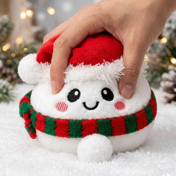 Hand squeezing the Chilly Snowman Dumpling Squishy Plush