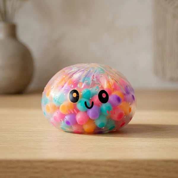 Collectible squishy dumpling displayed on a desk surface