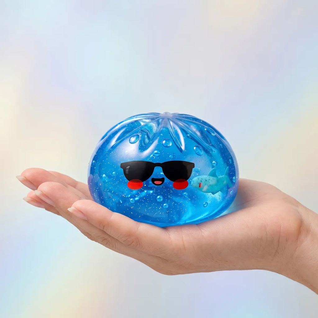 Sunglasses dumpling squishy held in hand