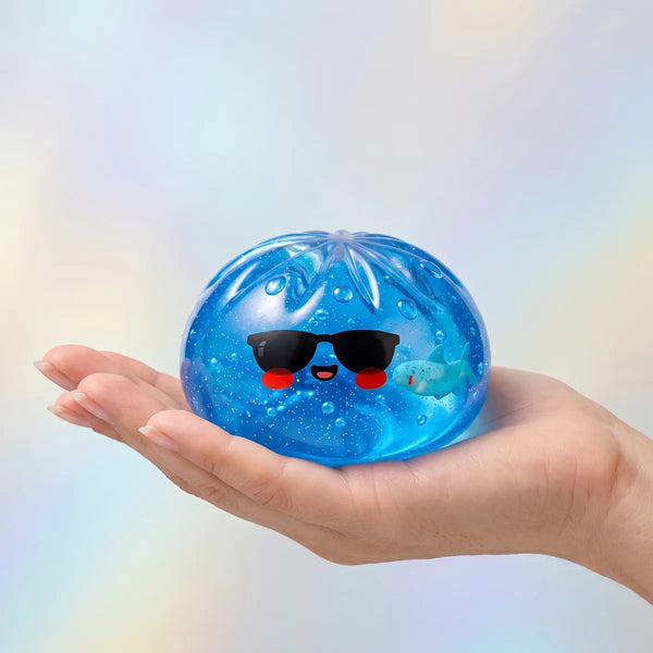 Sunglasses dumpling squishy held in hand