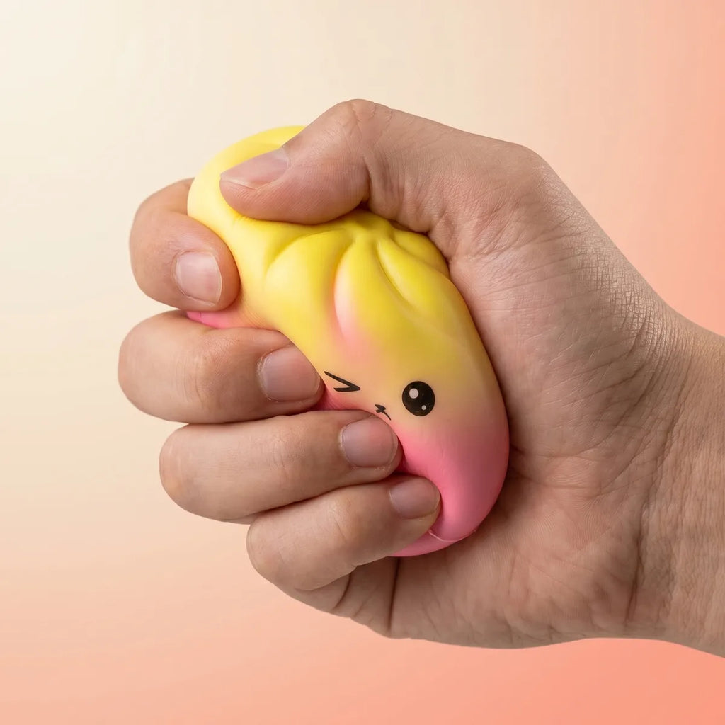 Viral mystery dumpling squishy being squeezed showing slow rising foam