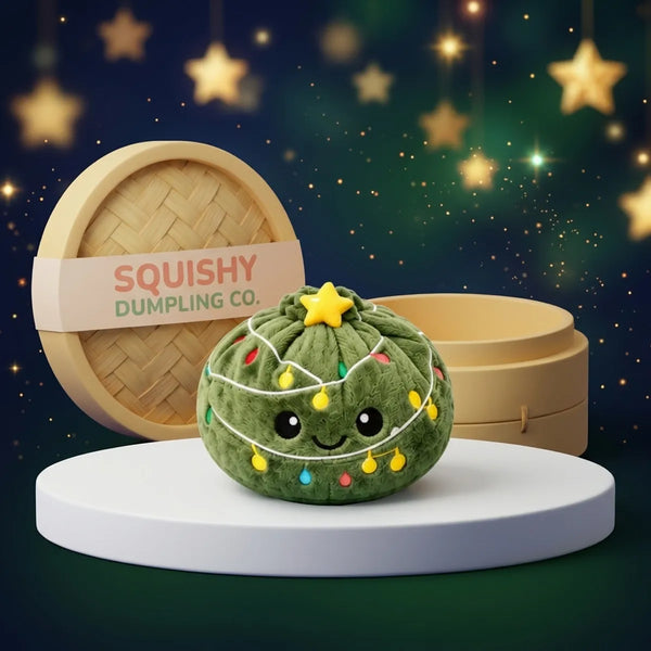 Twinkle Xmas Tree Dumpling Squishy Plush on a white studio podium beside a steamer basket